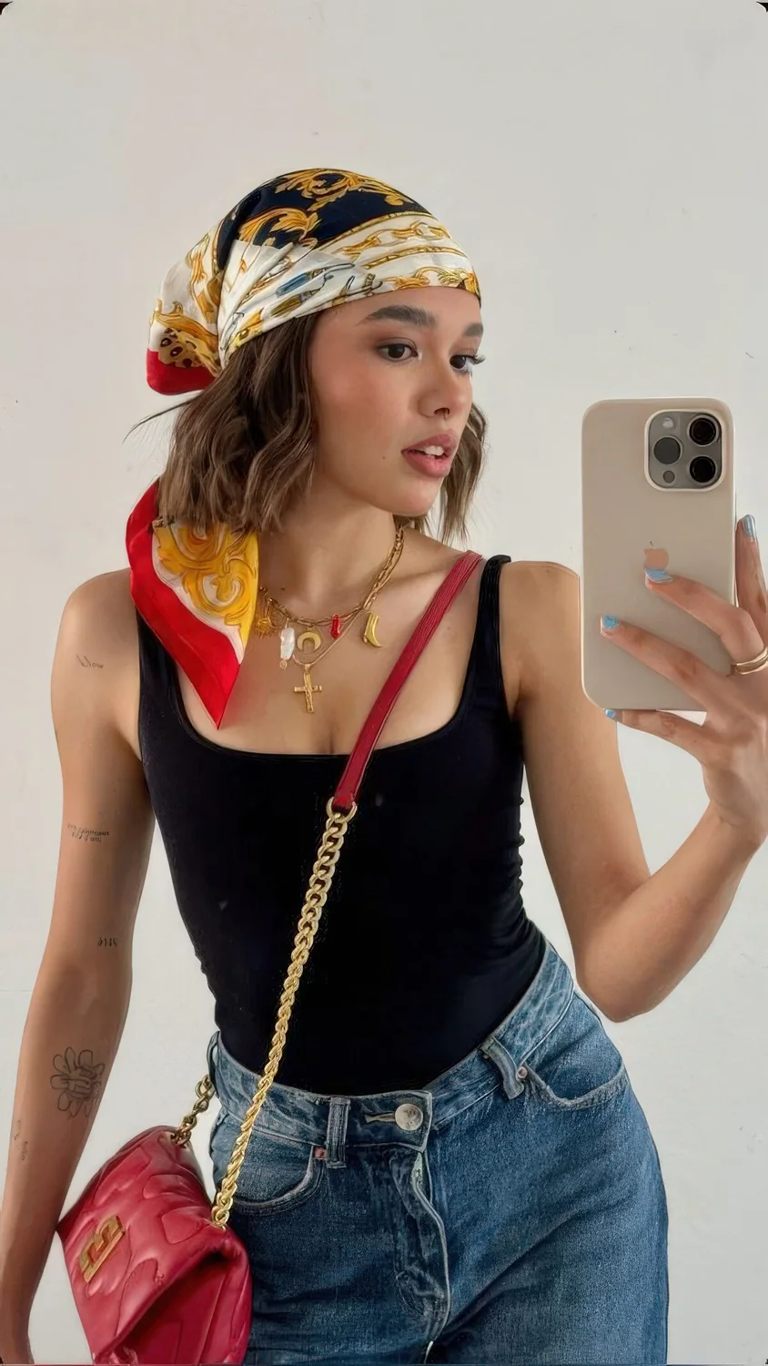 Photo showing colorful scarf, with the hairstyle clearly visible.