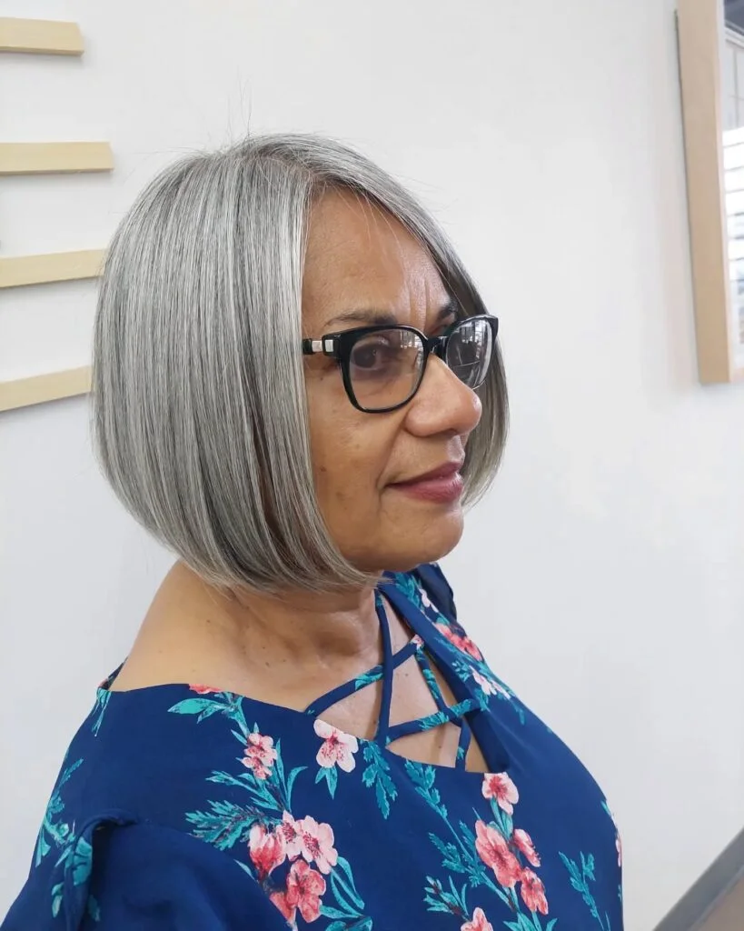 chin straight silver bob shown as a bob hairstyles for women over 60 idea
