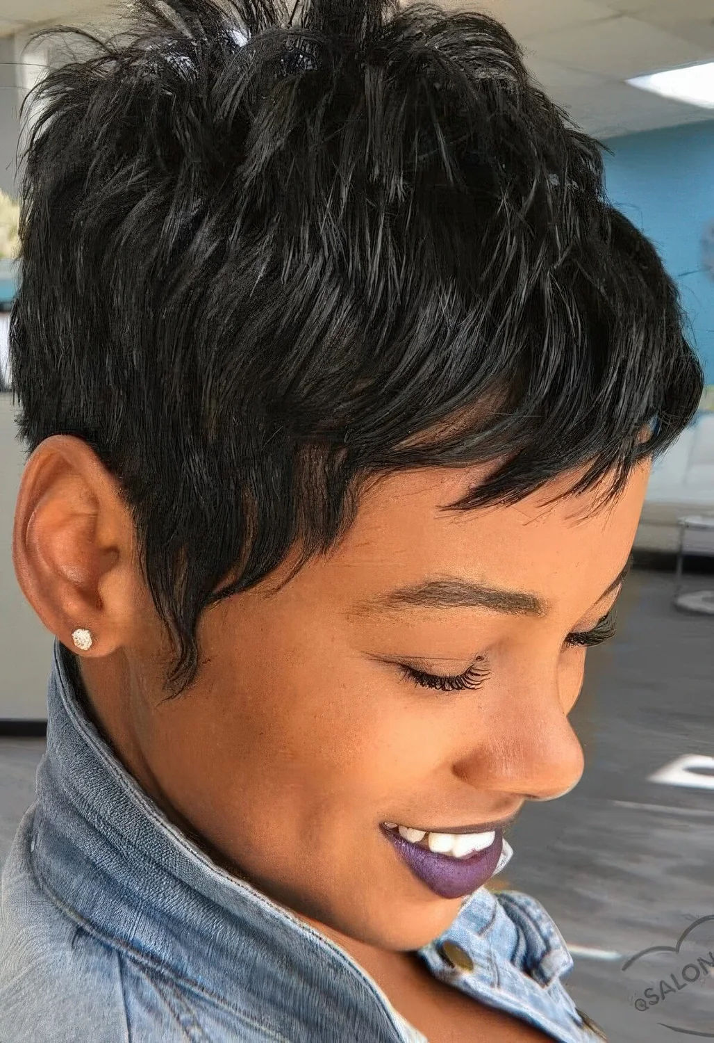 Eye catchy black pixie with a lot of volume and a bit of bangs.