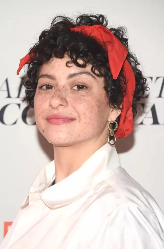 Alia Shawkat's Betty Boop bangs require minimal styling and look so cute with a simple oversized bow tied around the crown.