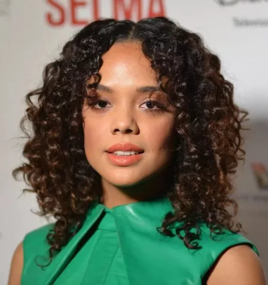 Photo showing center part, with the hairstyle clearly visible.
