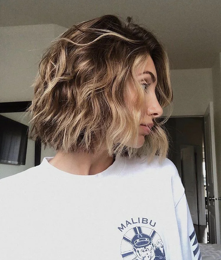 Photo showing dark bob blonde highlights, with the hairstyle clearly visible.