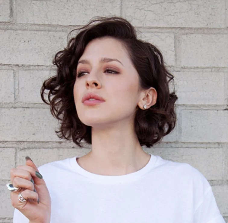 Photo showing dark chestnut bob, with the hairstyle clearly visible.