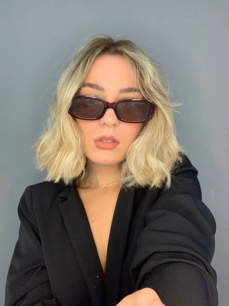 Photo showing neutral long bob, with the hairstyle clearly visible.