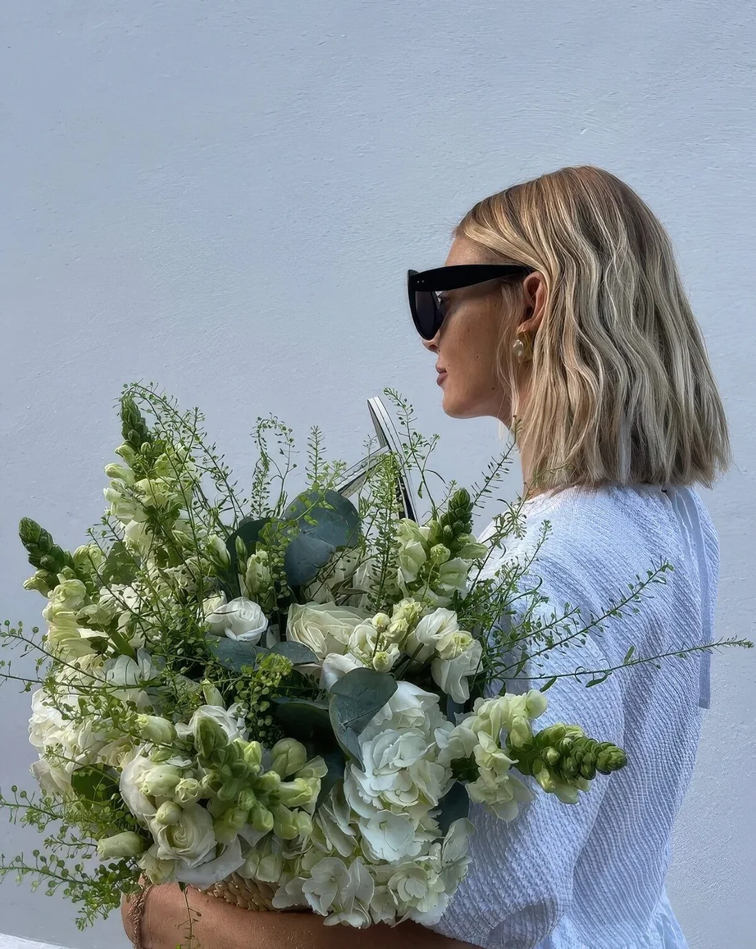 Photo showing long bob hairstyle, with the hairstyle clearly visible.