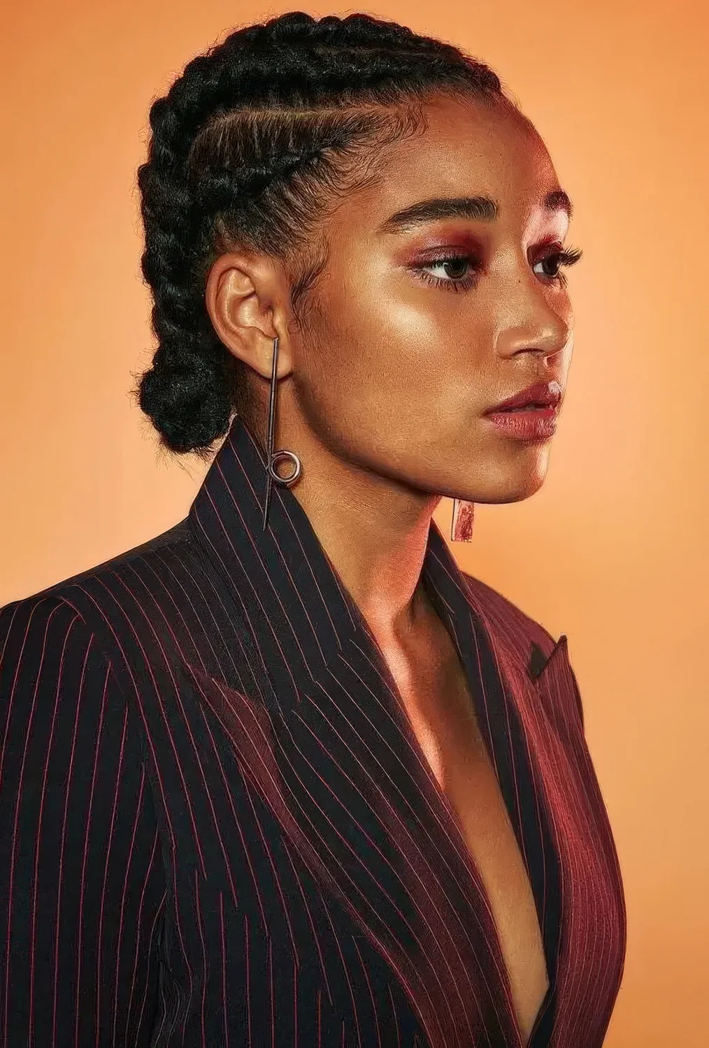 Braided low bun plus a braided top look very chic and cool and such a hairstyle.