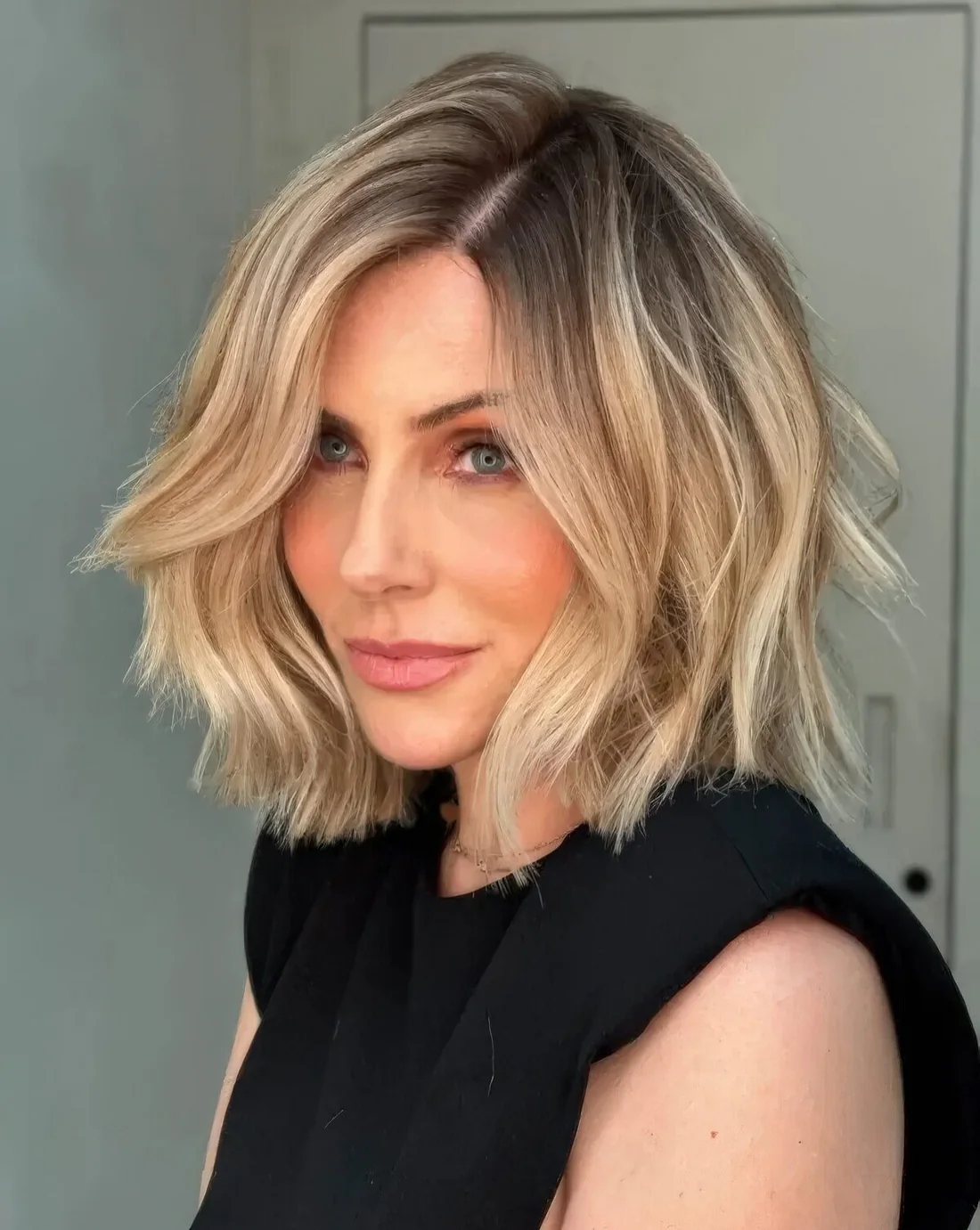 Photo showing messy blunt bob, with the hairstyle clearly visible.