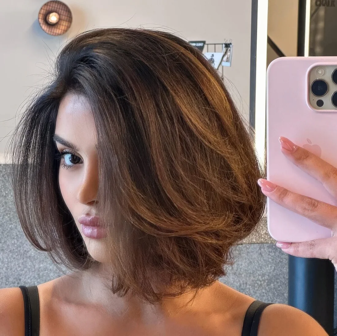 Slight layers cut and added to the blunt bob.