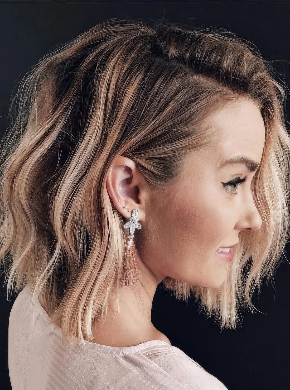 Photo showing brunette bob with highlights, with the hairstyle clearly visible.
