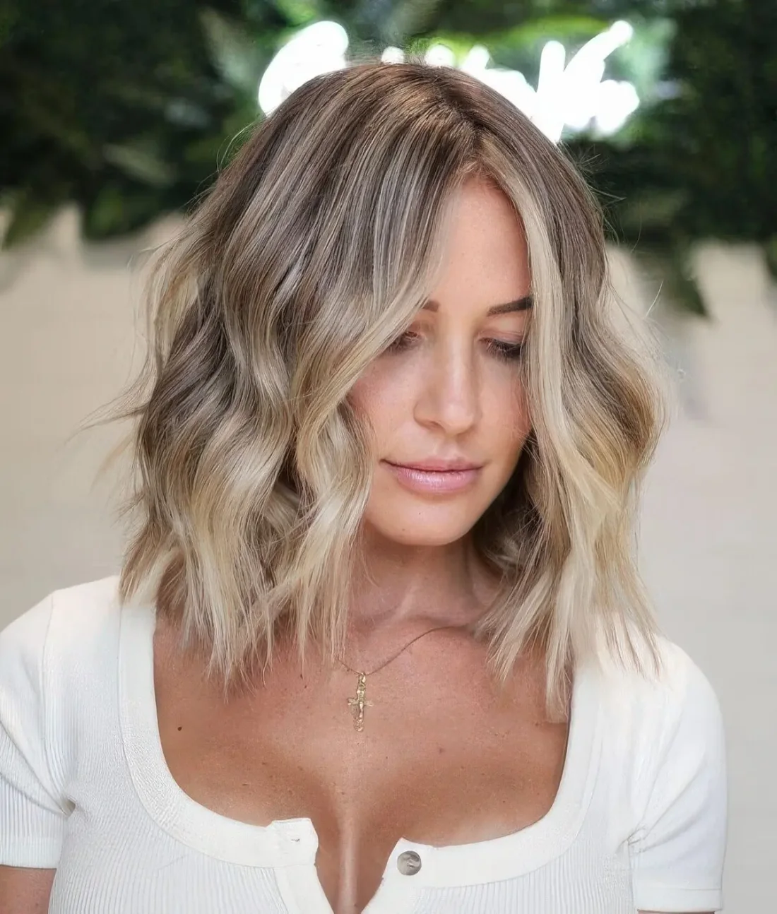 Bronde long wavy bob with textural waves.