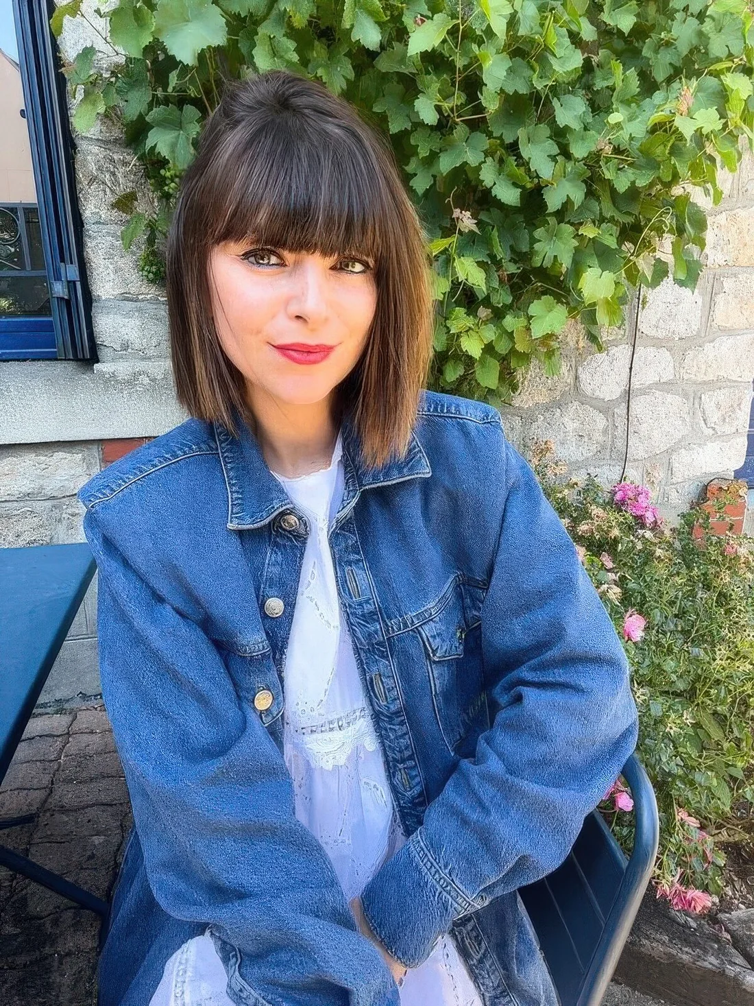 Classic dark brunette bob with a classic fringe.