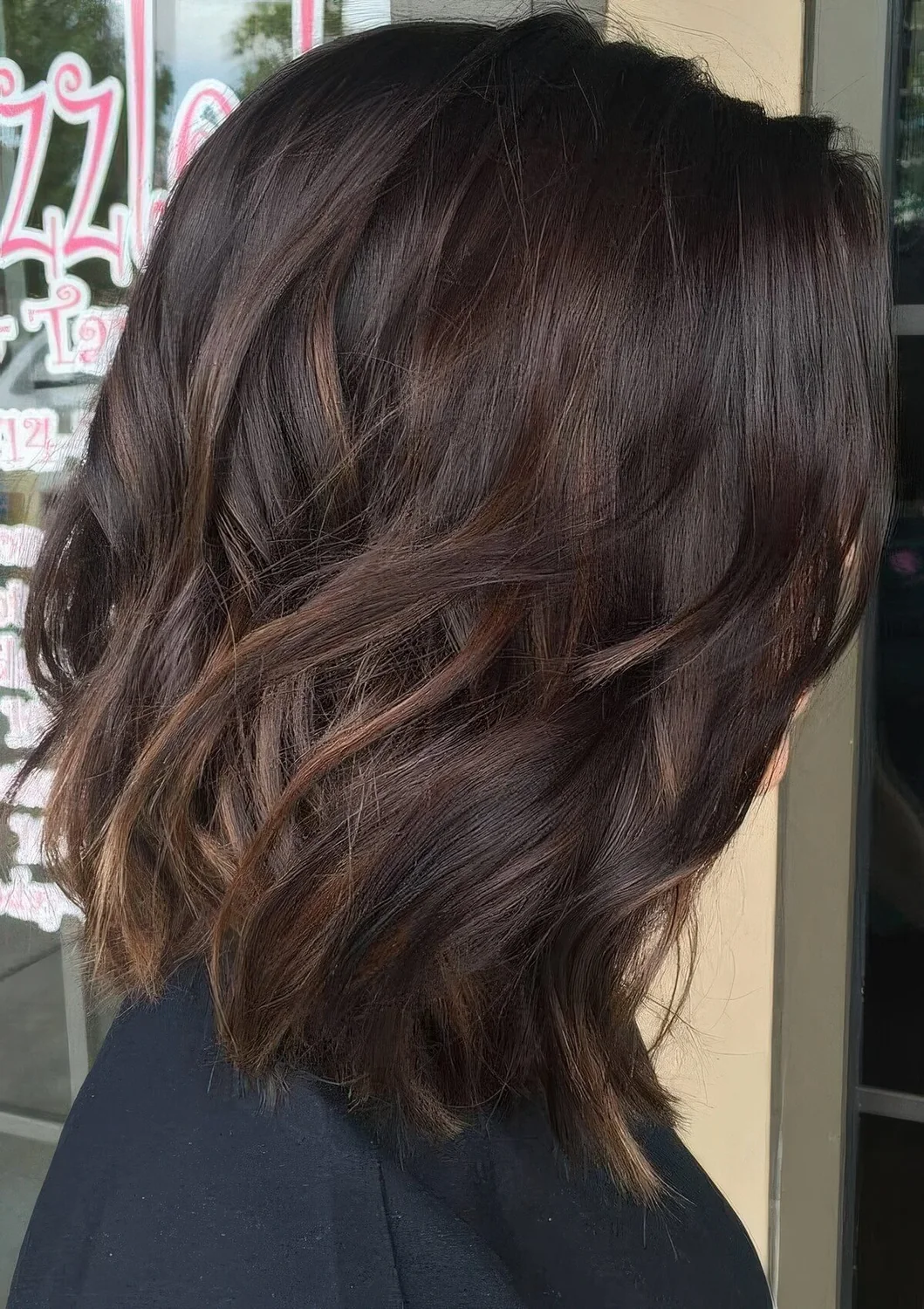 Photo showing wavy bob, with the hairstyle clearly visible.