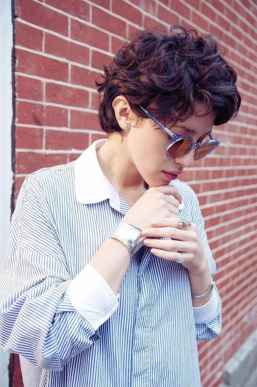 Chocolate brown wavy bixie and a lot of volume.
