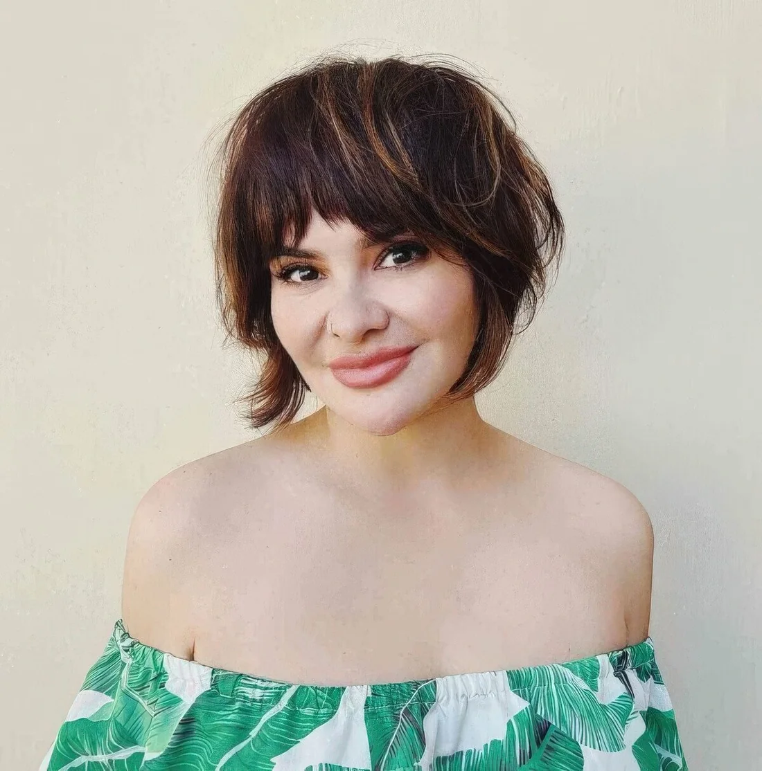 Shagged out bixie cut with short choppy bangs.