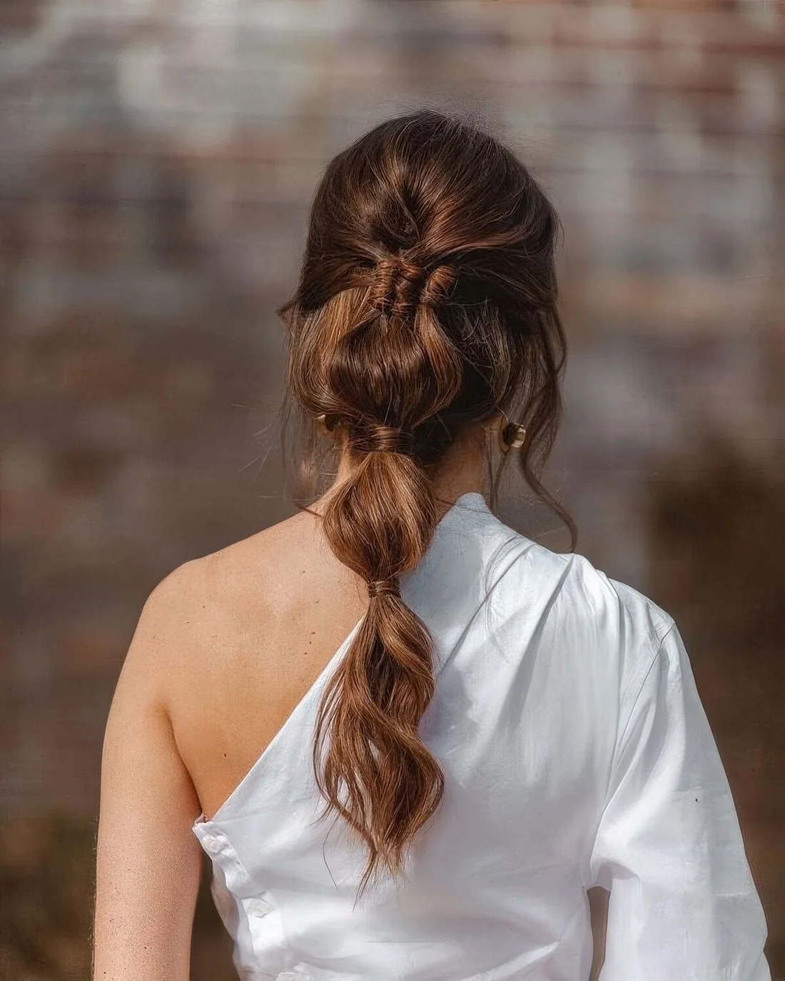 Wedding hairstyle with a bubble braid.