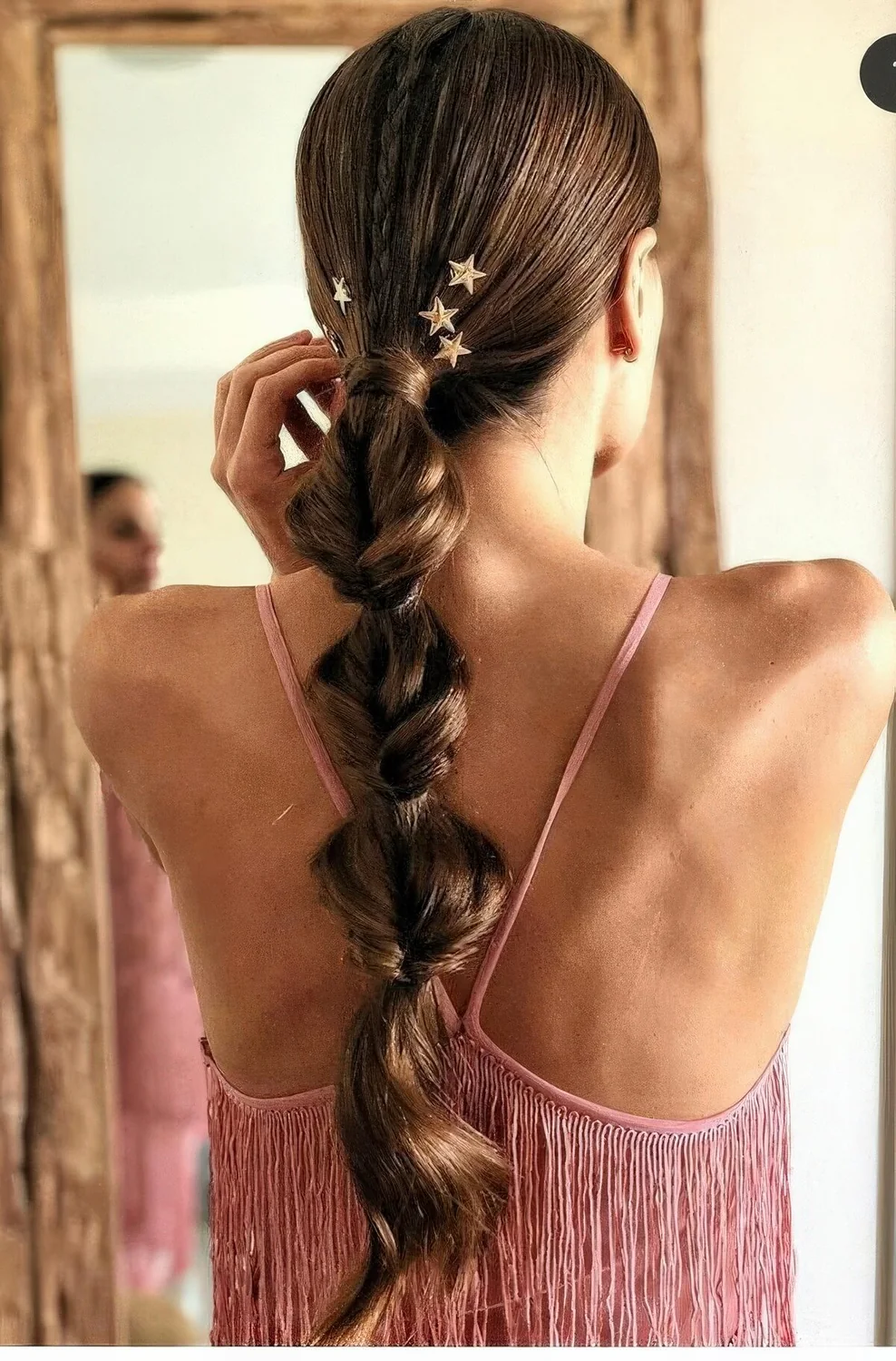Long loose twisted bubble braid with a smaller braid on top and little stars accenting the look.