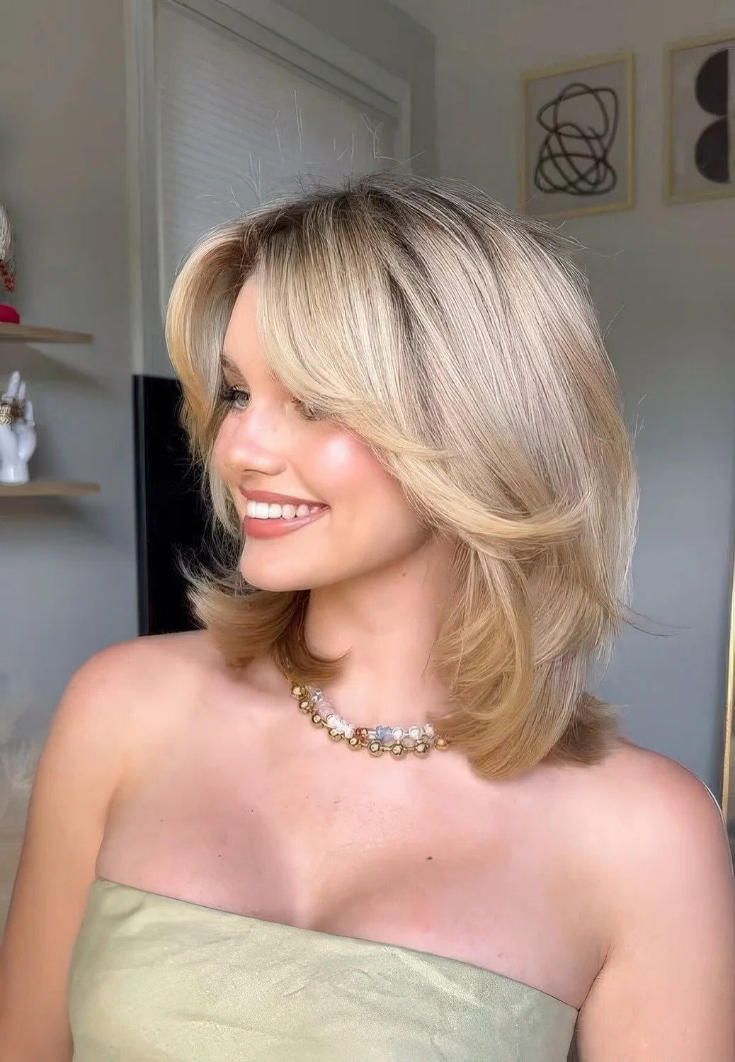 90s inspired long butterfly bob with curtain bangs.