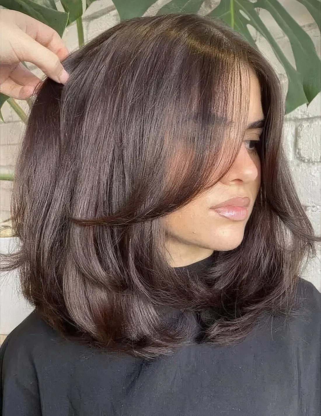 Long butterfly bob in a rich chocolate tone.