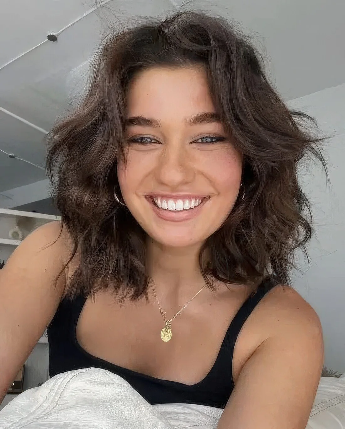 Messy textured wavy long bob with a lot of volume.