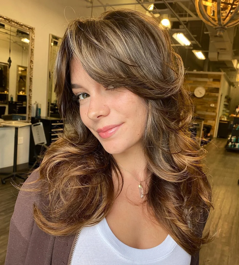 shoulder wavy chestnut lob shown as a butterfly haircut long hairs idea