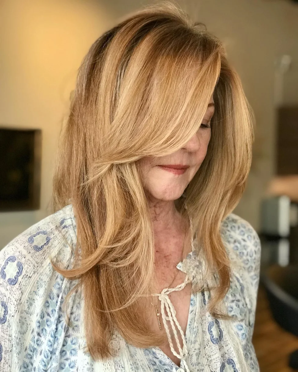 chest straight honey layers with curtain fringe shown as a butterfly haircut long hairs idea
