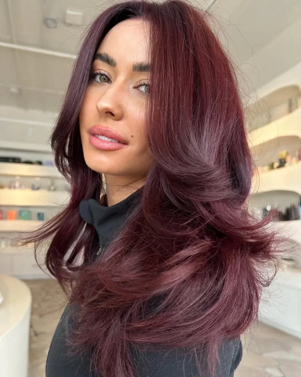 chest wavy cherry cola layers shown as a butterfly haircut long hairs idea