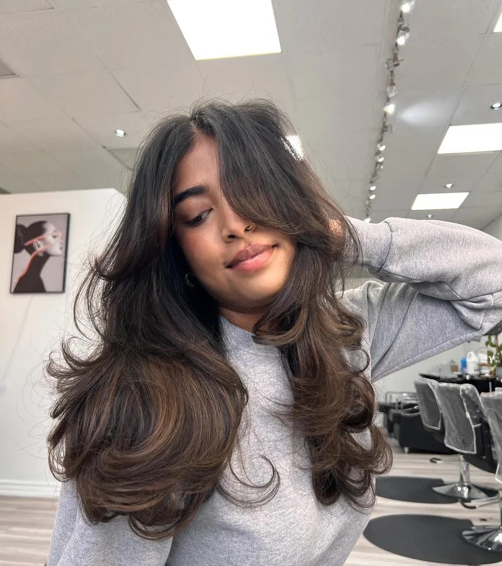 shoulder wavy brunette layers with curly fringe fringe shown as a butterfly haircut long hairs idea