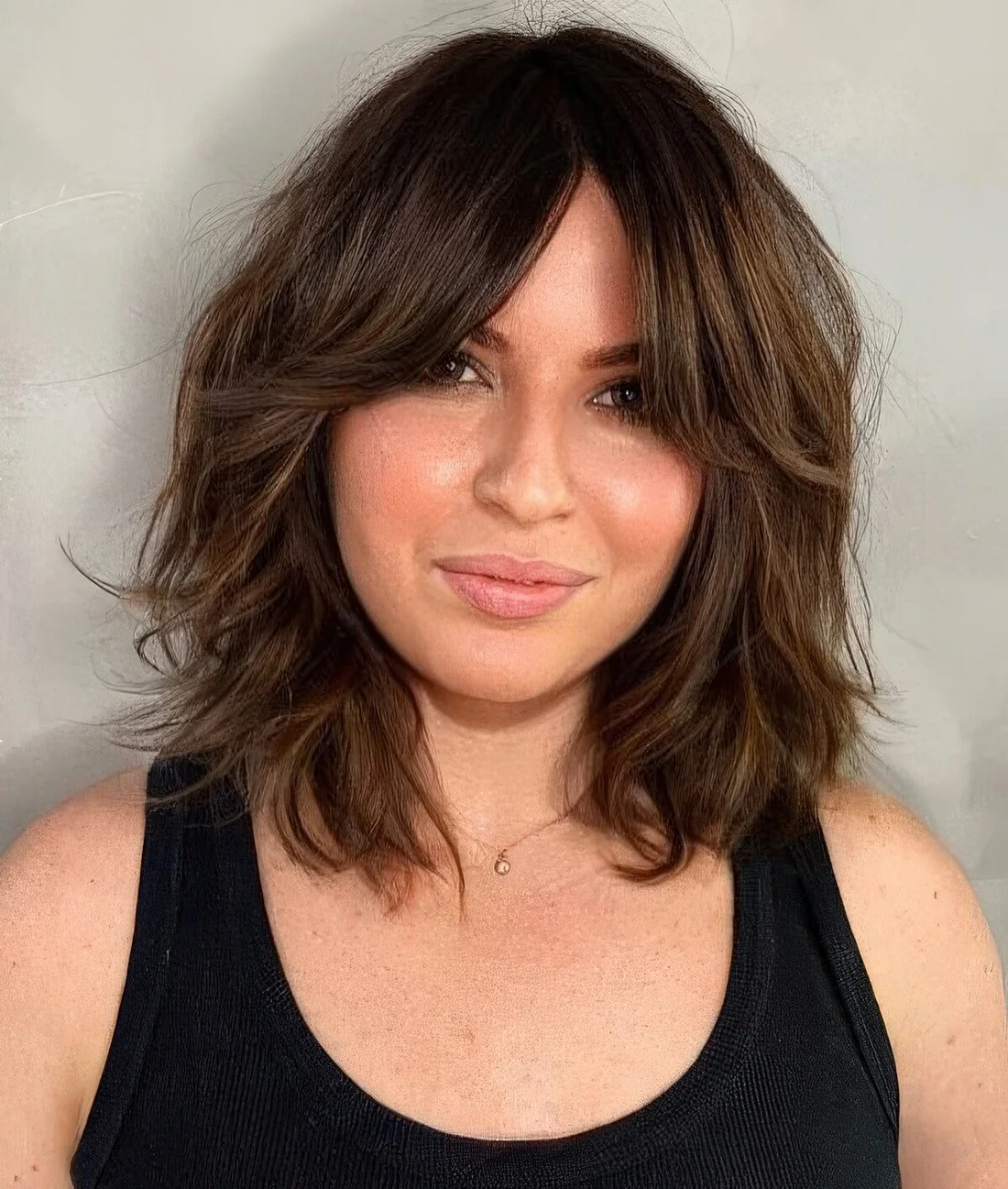 Photo showing long bob hairstyle, with the hairstyle clearly visible.