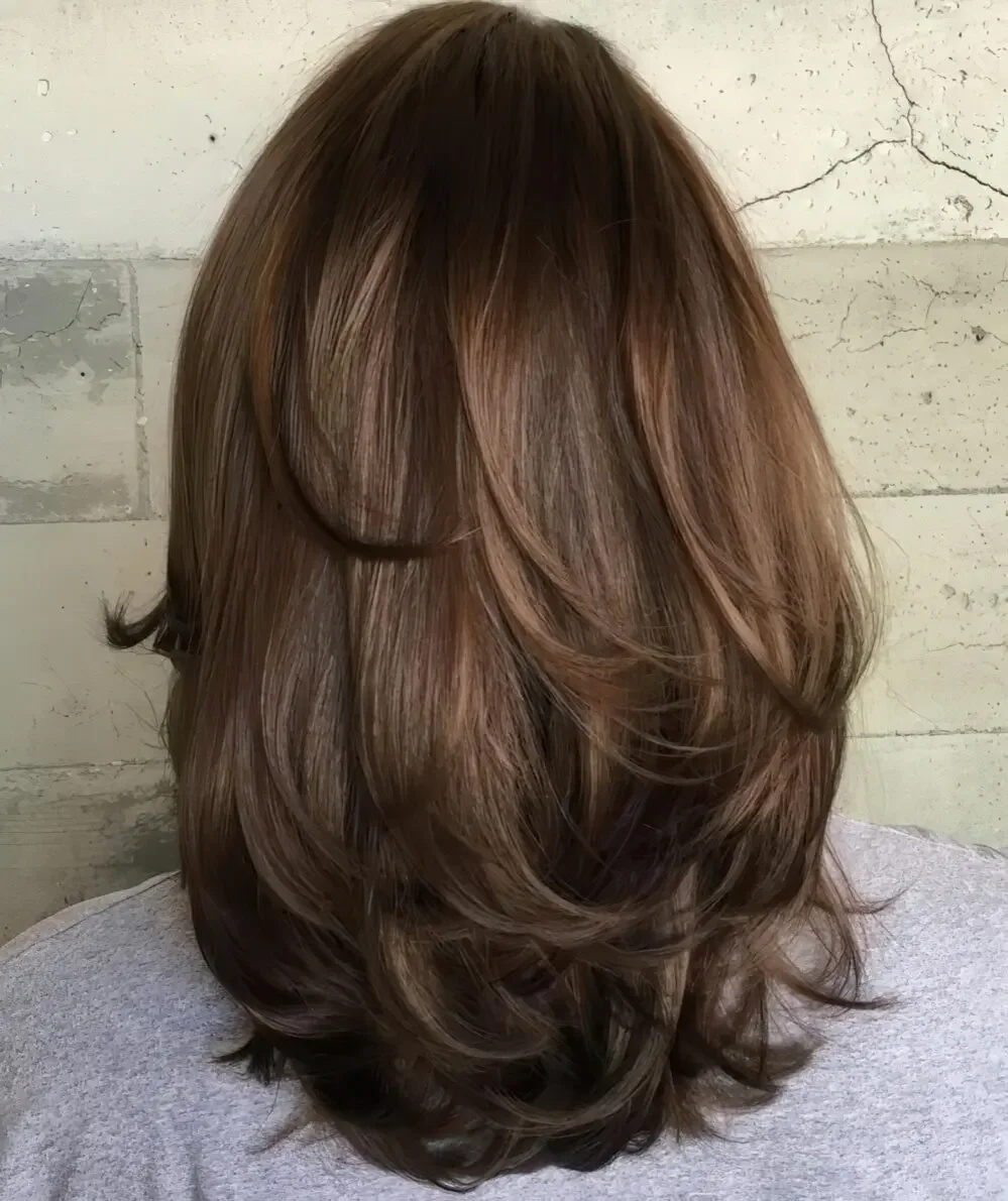 Medium layer haircut for thick hair.
