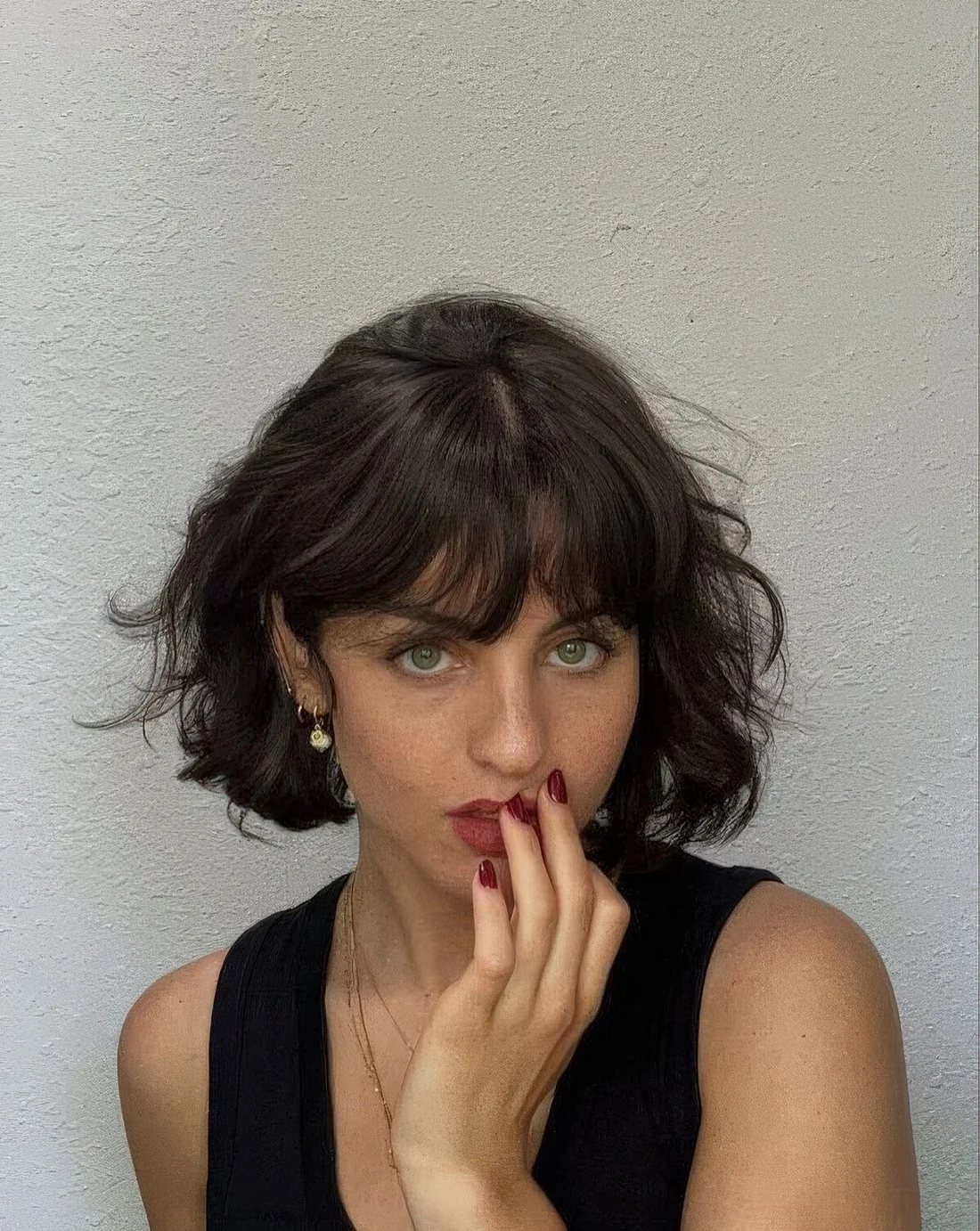 Photo showing chin-length bob, with the hairstyle clearly visible.