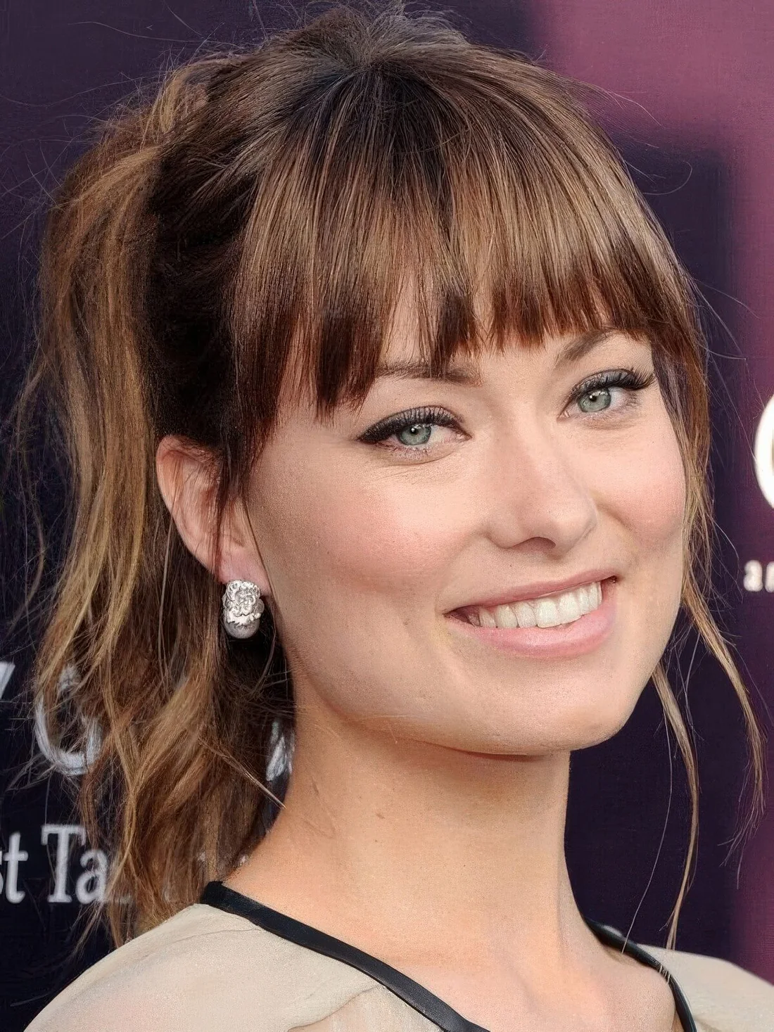Photo showing choppy bangs ponytail, with the hairstyle clearly visible.
