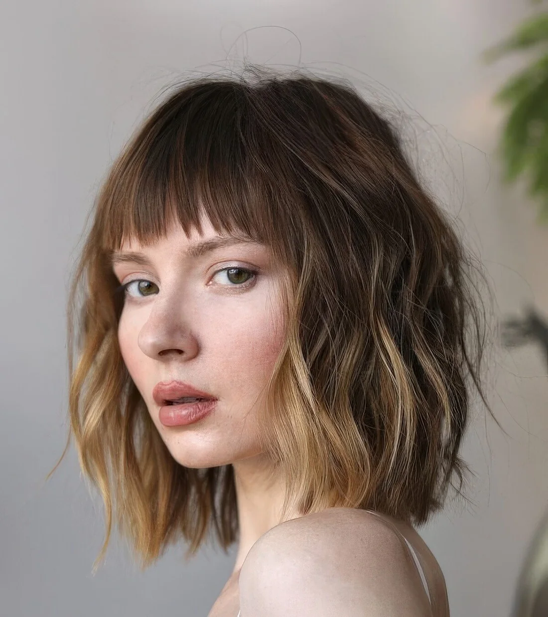 Photo showing clavicle bob choppy bangs, with the hairstyle clearly visible.