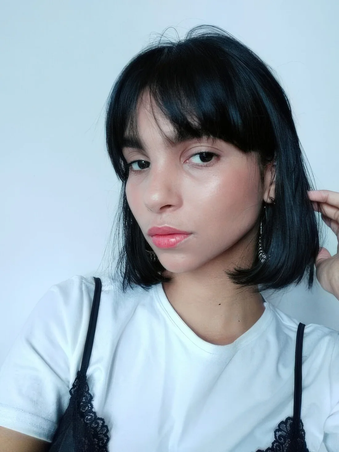 Photo showing midi bob choppy bangs, with the hairstyle clearly visible.