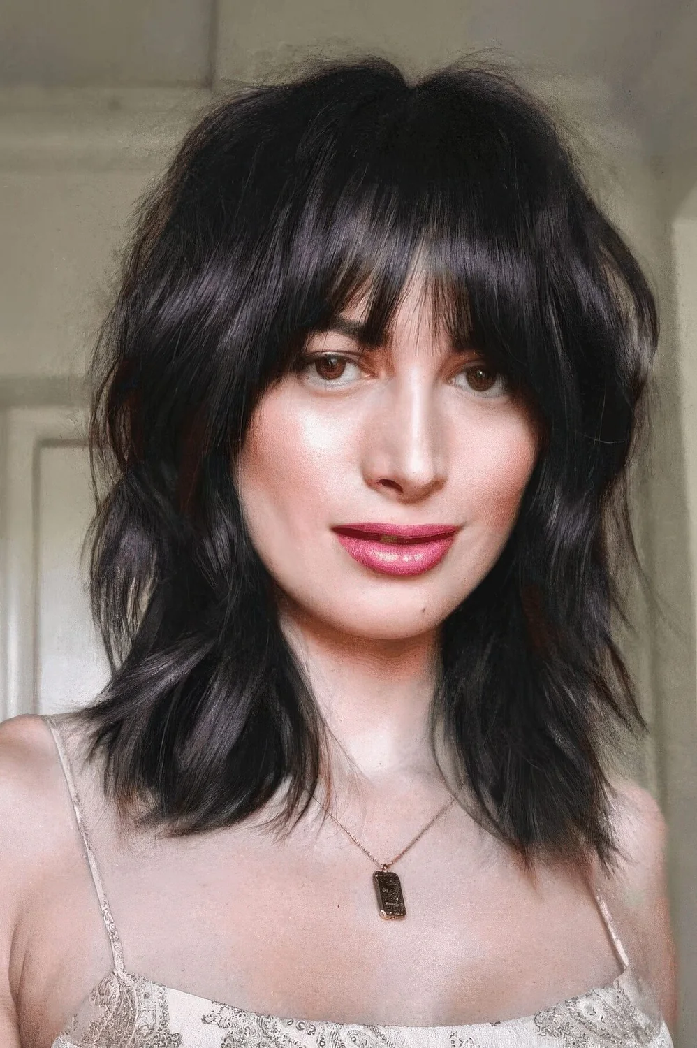 Photo showing shaggy cut and fringe, with the hairstyle clearly visible.