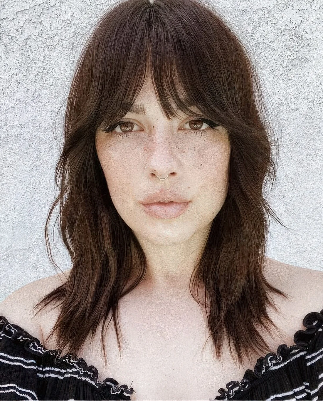 Photo showing shaggy medium hair, with the hairstyle clearly visible.