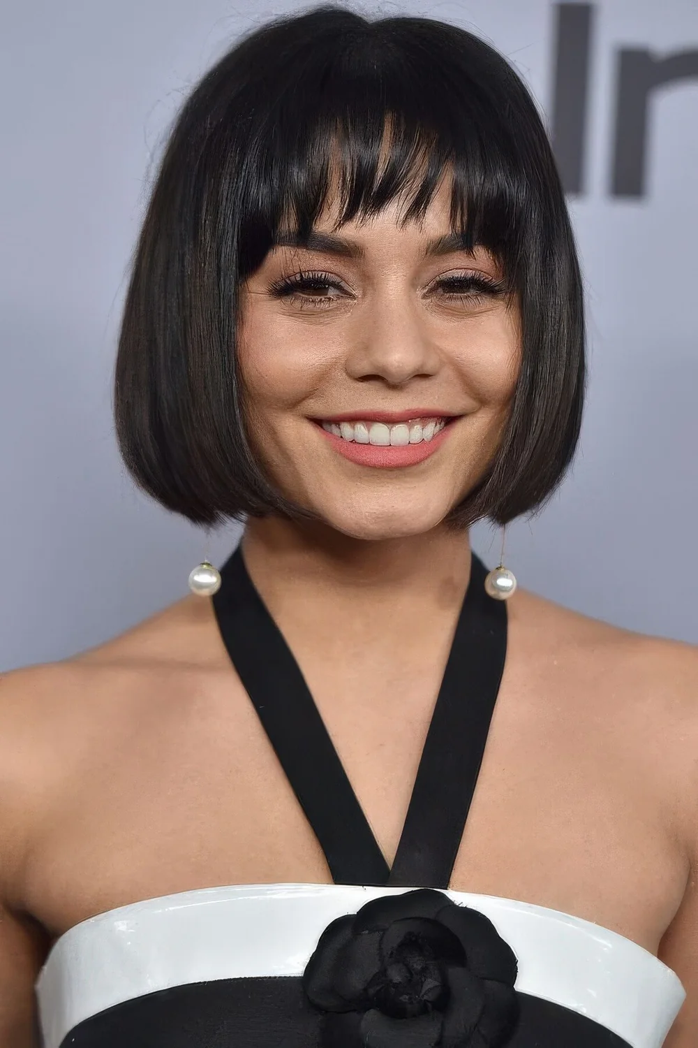Photo showing short black bob choppy bangs, with the hairstyle clearly visible.