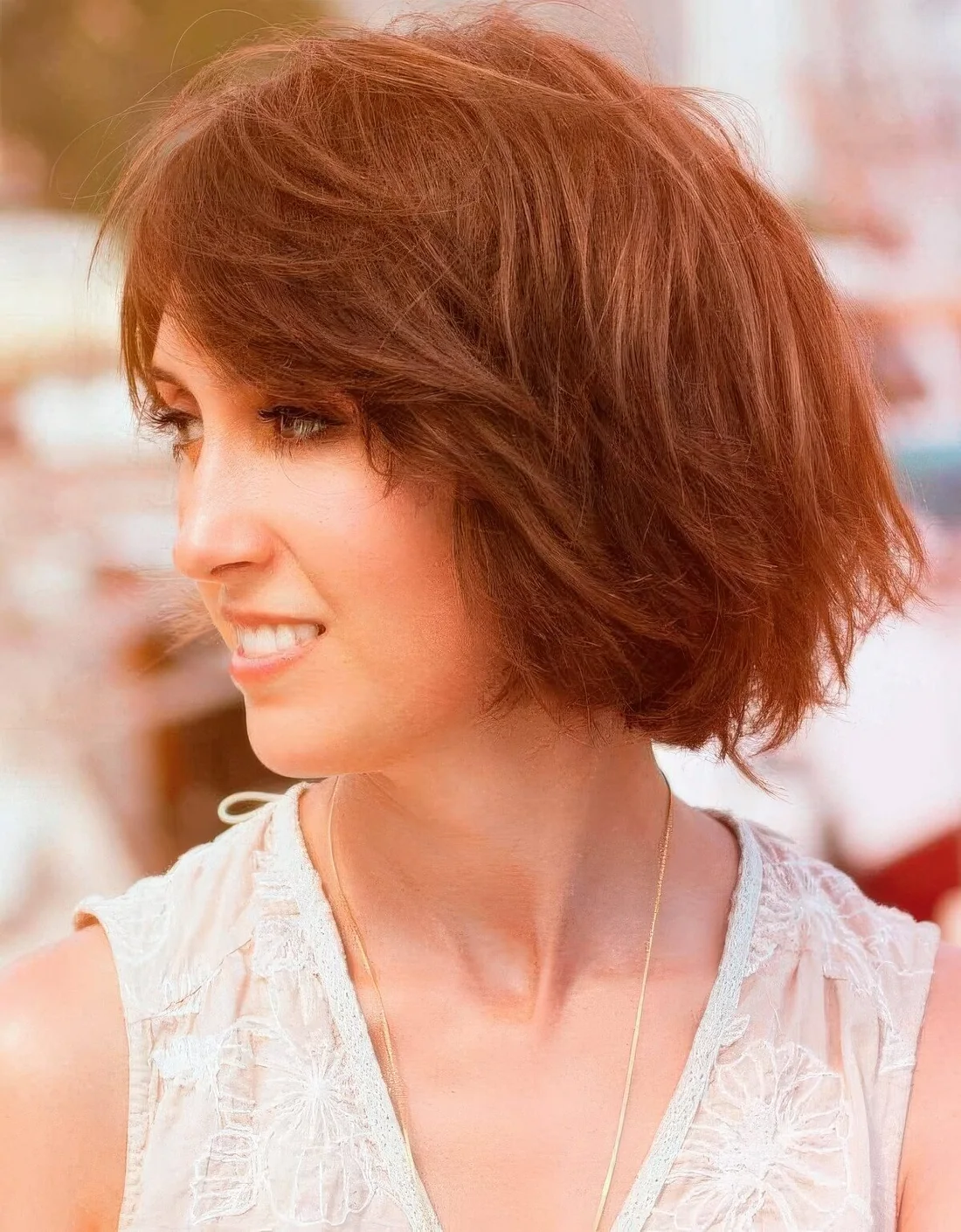 Layered medium choppy bob features long twisty layers.