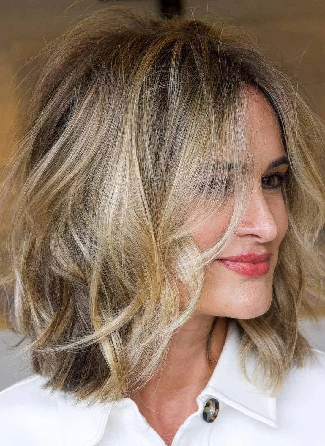 Photo showing middle part textured bob, with the hairstyle clearly visible.