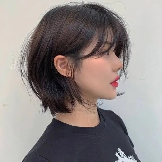 chin wavy black bob shown as a choppy bob hairstyles for fine hair idea