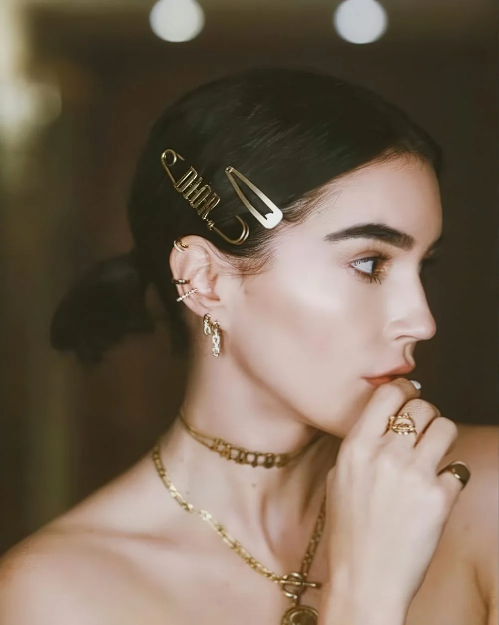 Photo showing hair clips, with the hairstyle clearly visible.