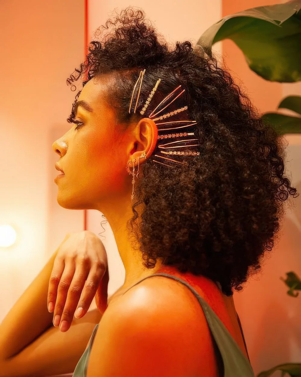 Photo showing curls and hair pins, with the hairstyle clearly visible.