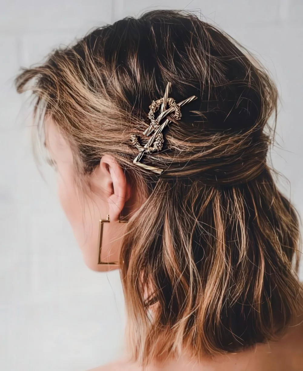 Photo showing messy half updo, with the hairstyle clearly visible.