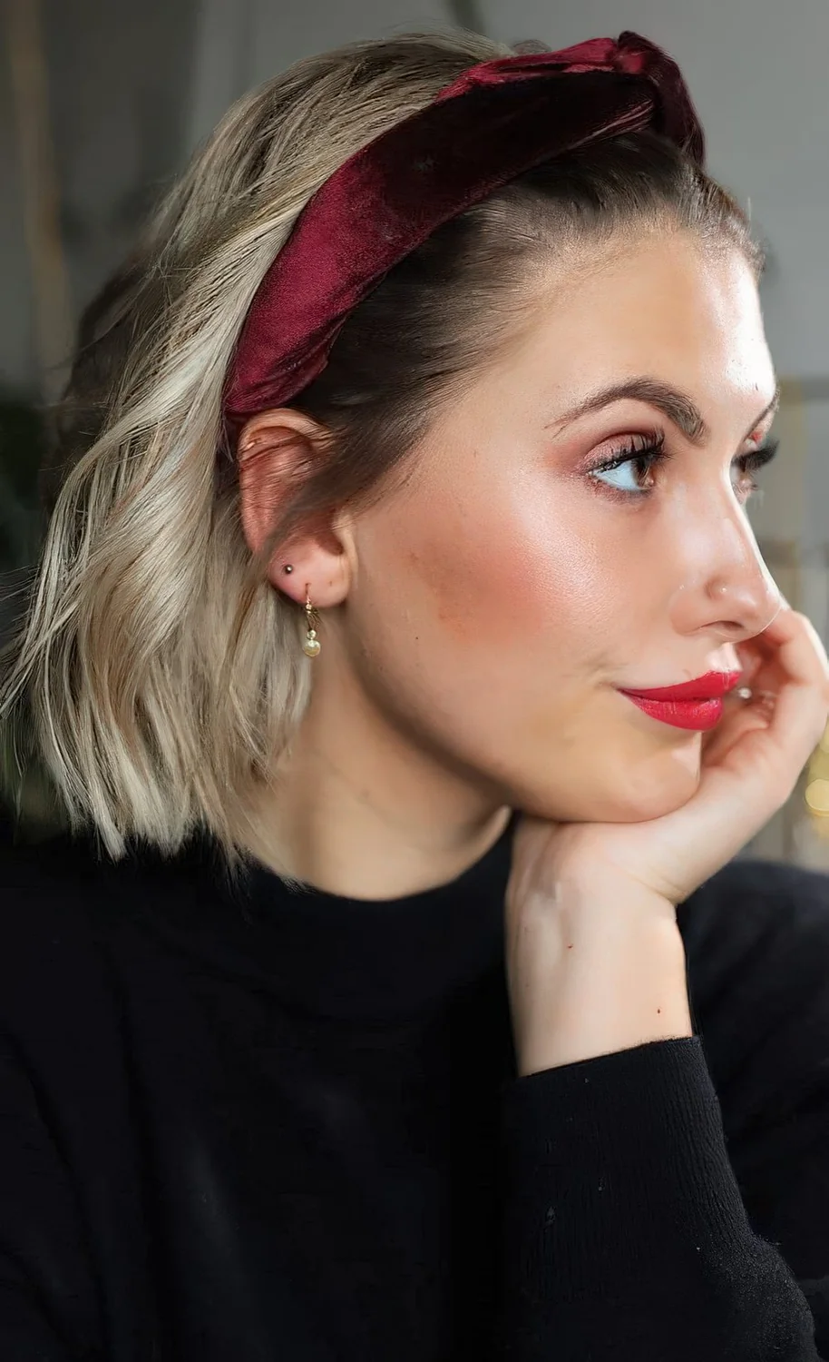Photo showing burgundy headband, with the hairstyle clearly visible.
