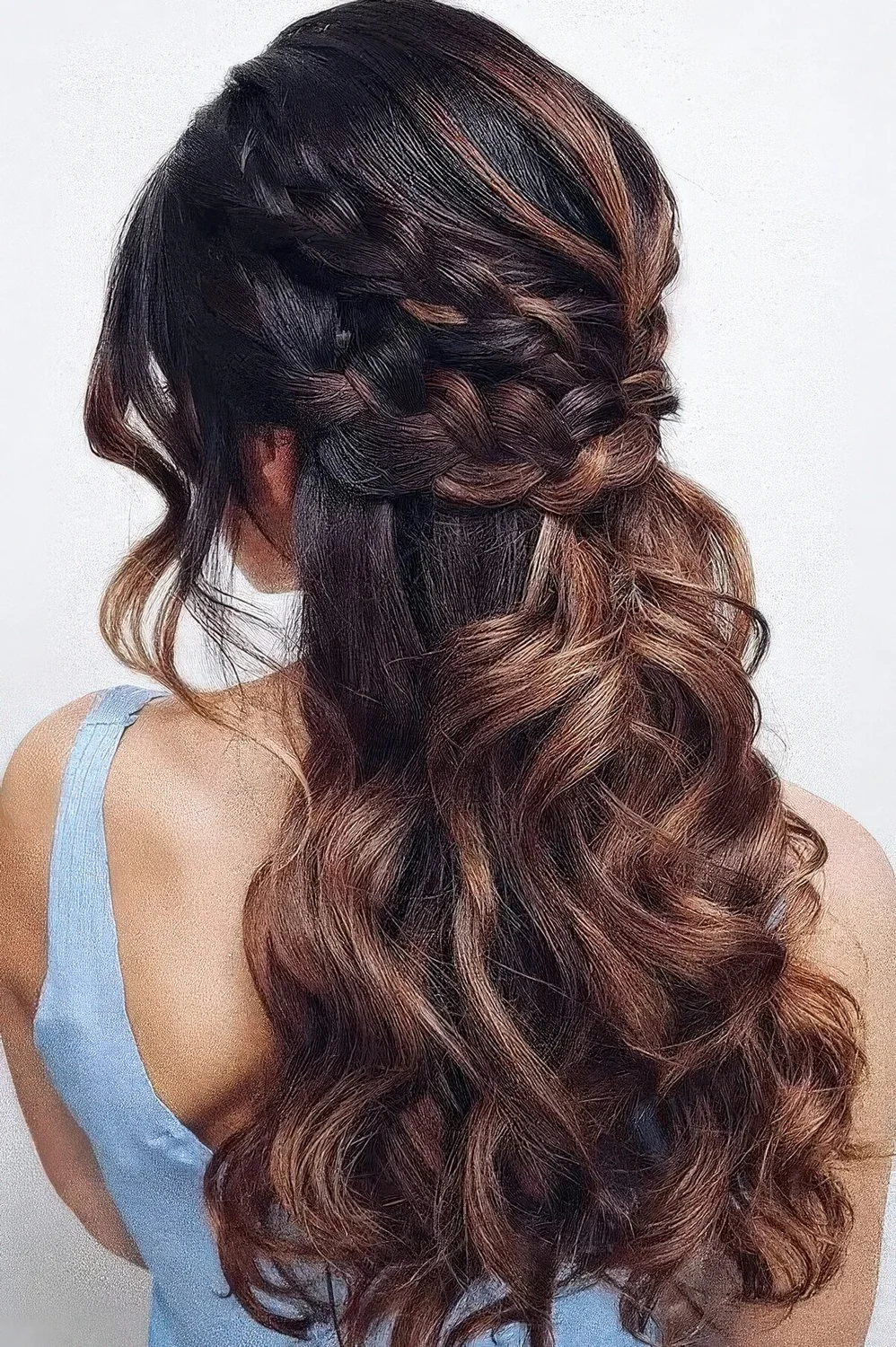Boho half updo with a double braided halo and waves down, waves framing the face and caramel balayage that.