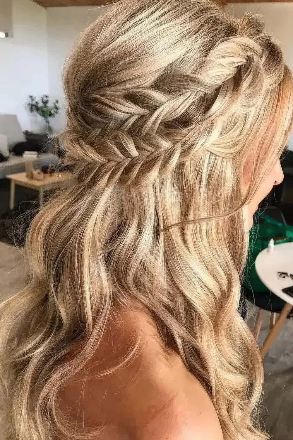 Boho half updo with a double braided halo and waves down plus a bump requires no accessories as it's gorgeous itself.