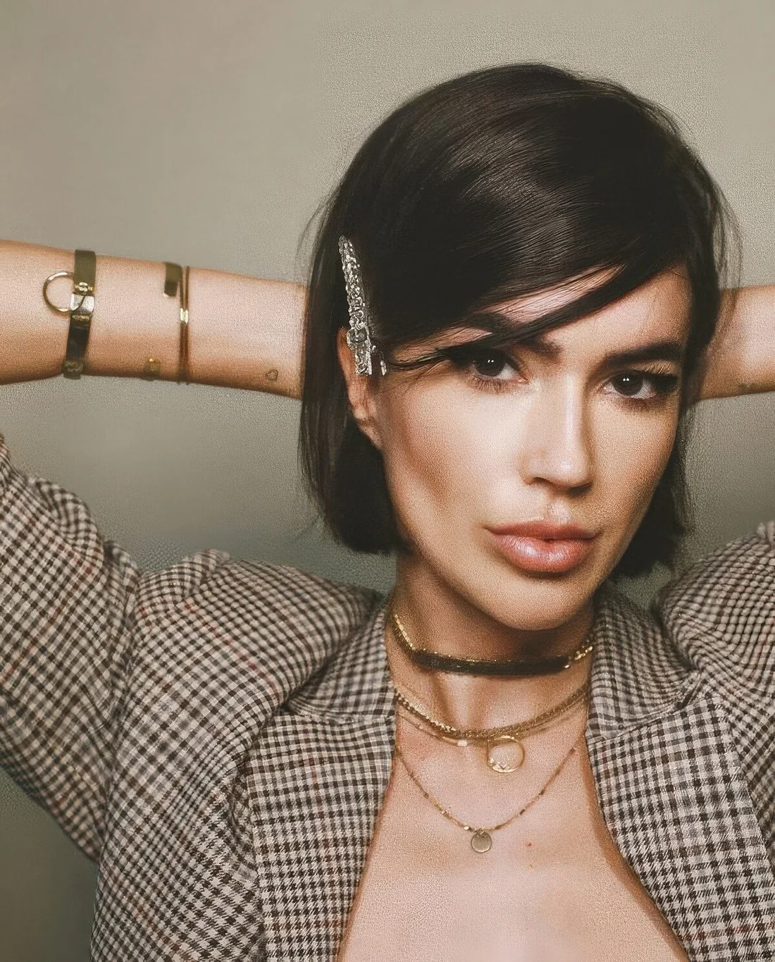 Photo showing midi bob hairstyle, with the hairstyle clearly visible.