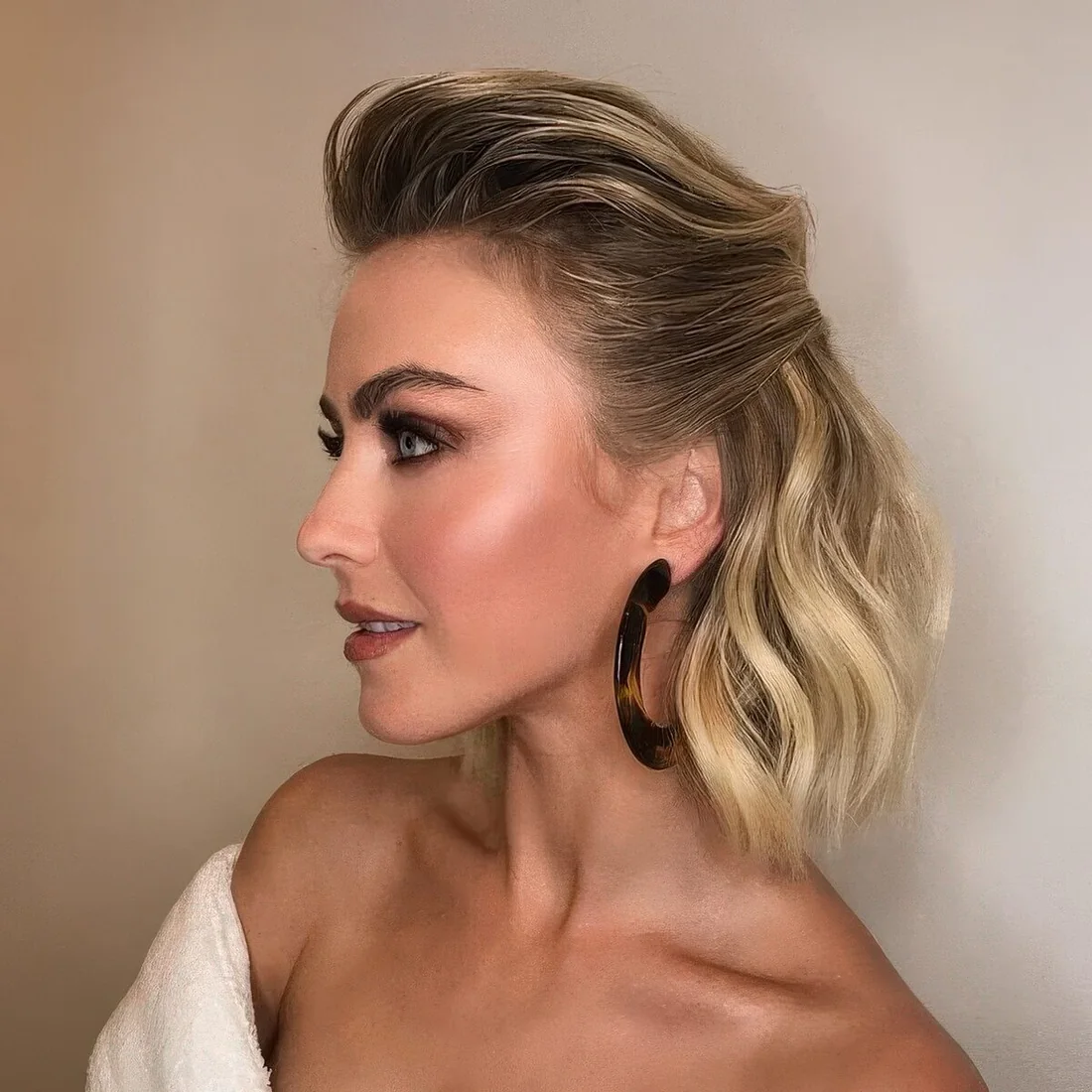 Classic half updo with a volume on top and waves down.