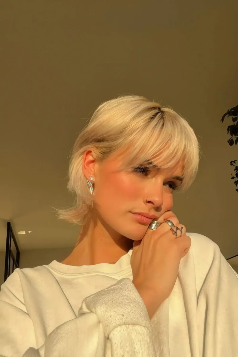 Photo showing bleached bixie, with the hairstyle clearly visible.