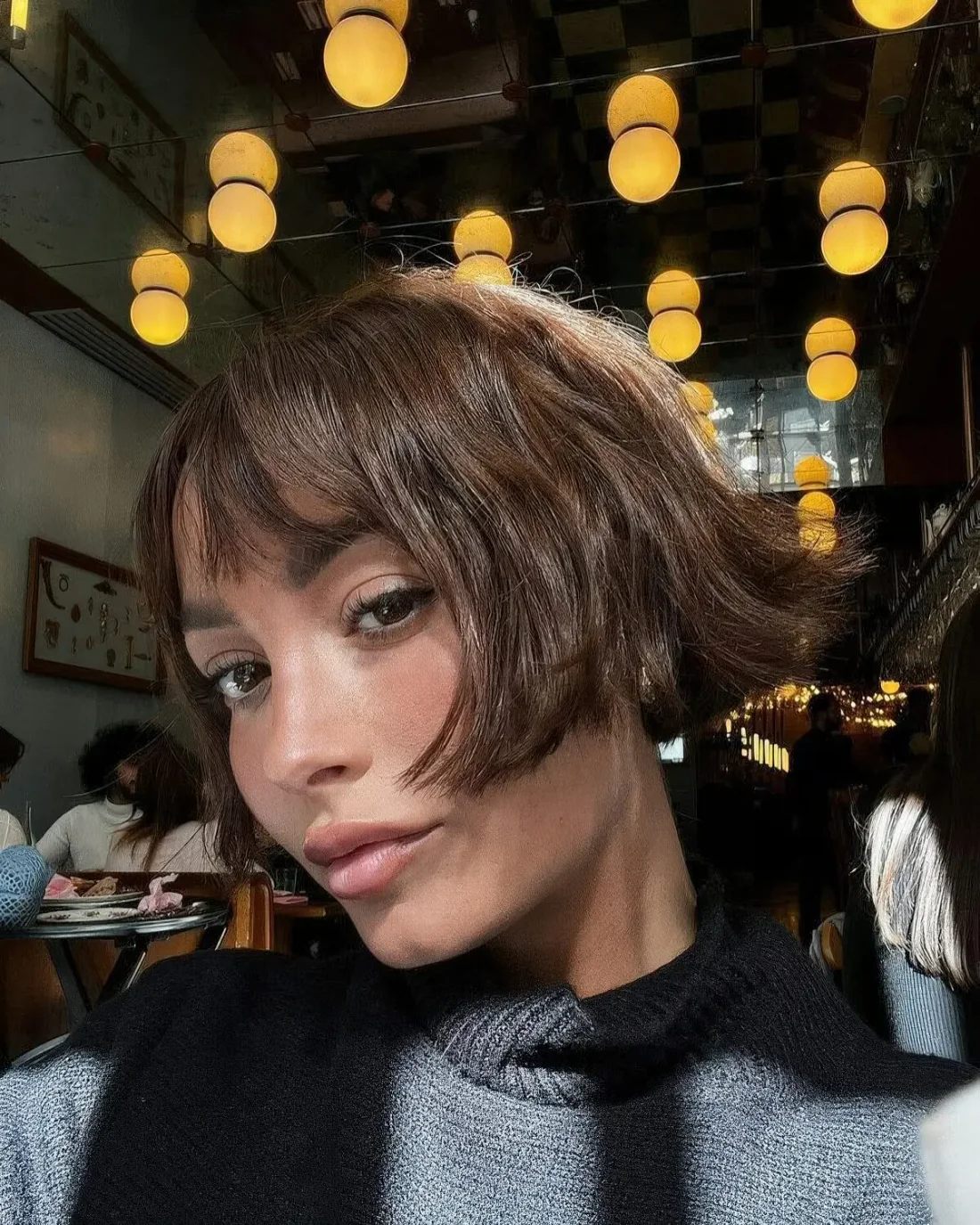 Photo showing ear-length bob, with the hairstyle clearly visible.