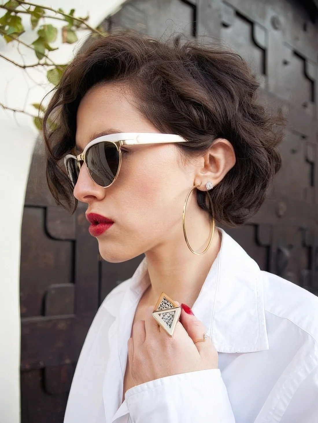Very short fresh stacked curly bob to highlight the texture of your hair.